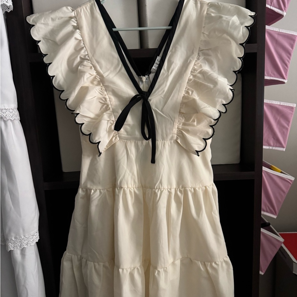 Cream Ruffled Tiered Dress with Black Trim & Tie